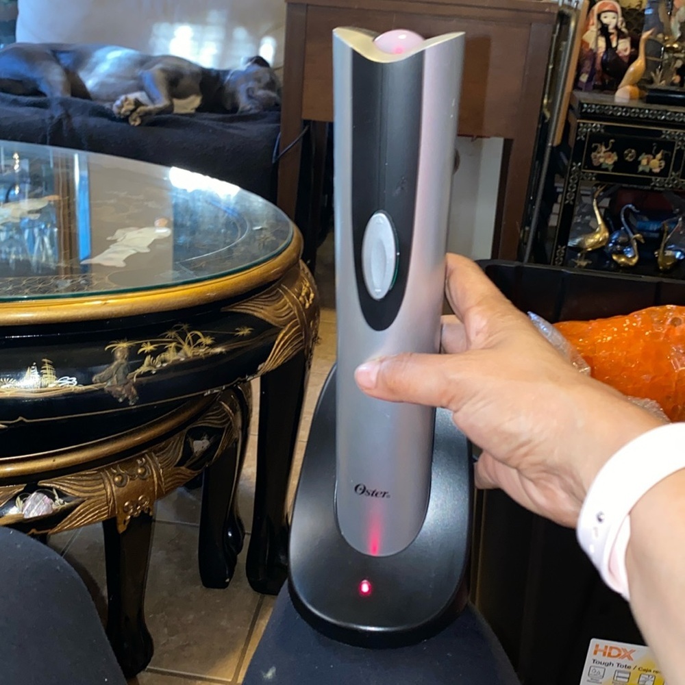 Bx47 Oster electric wine opener works fine